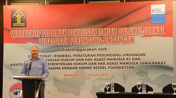 Dr. Daniel Heilmann, Resident Representative of HSF Indonesia, delivers the opening remarks