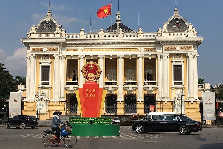 The date of the election is announced in front of the Opera House, a landmark of the capital of Vietnam, Hanoi.