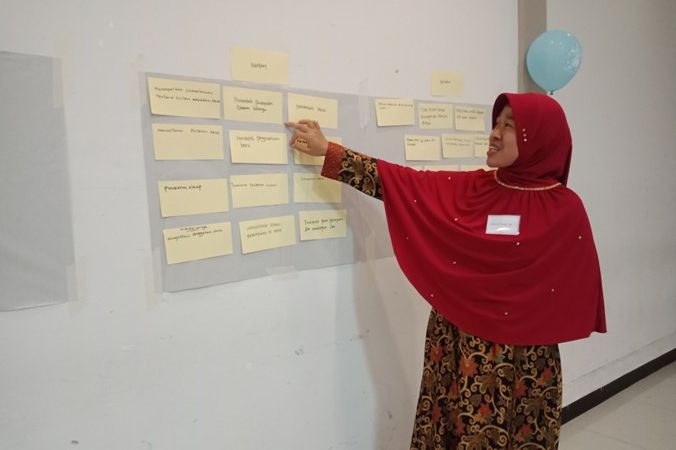 A participant presents the benefits of the training