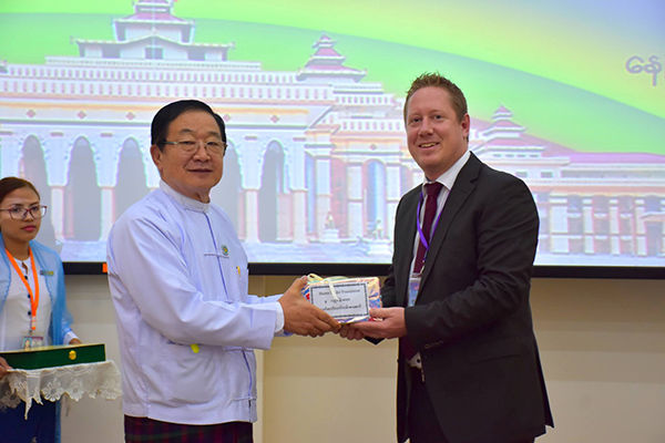 the hand-over ceremony of the Official Hluttaw Information Brochure 