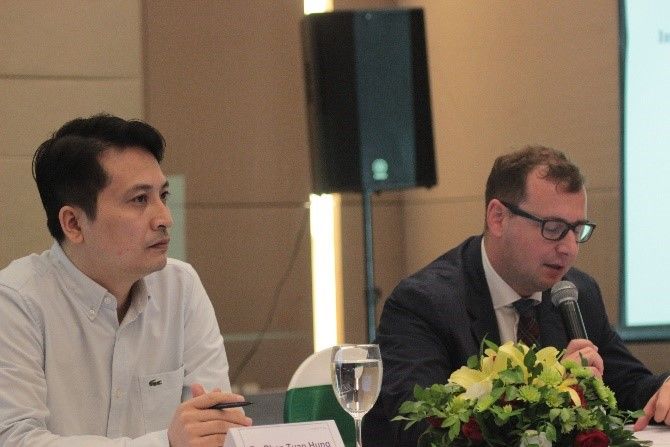 Mr. Pham Tuan Hung and Dr. Axel Neubert on the first day of the workshop.