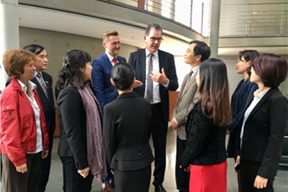 Federal Minister Gerd Müller, Federal Ministry for Economic Cooperation and Development (BMZ) and Member of Parliament Wolfgang Stefinger (CSU) in conversation with a Vietnamese parliamentary delegation on good governance in parliament.