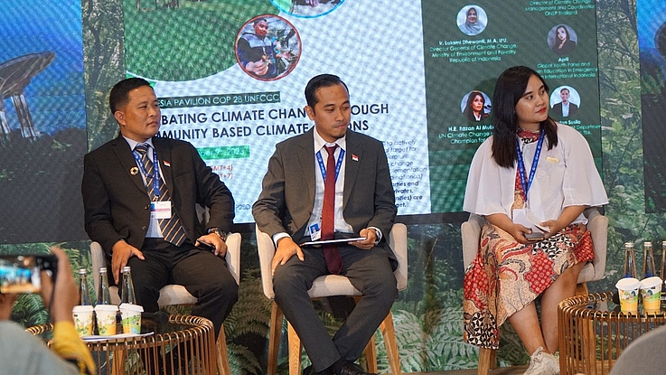 Representatives from Plan International Indonesia, Astra International and Local Champion participate as resource persons in a talk show on “Combating Climate Change through Community Based Climate Actions” at a side event