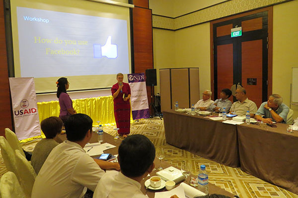 A project manager speaks in front of the participants