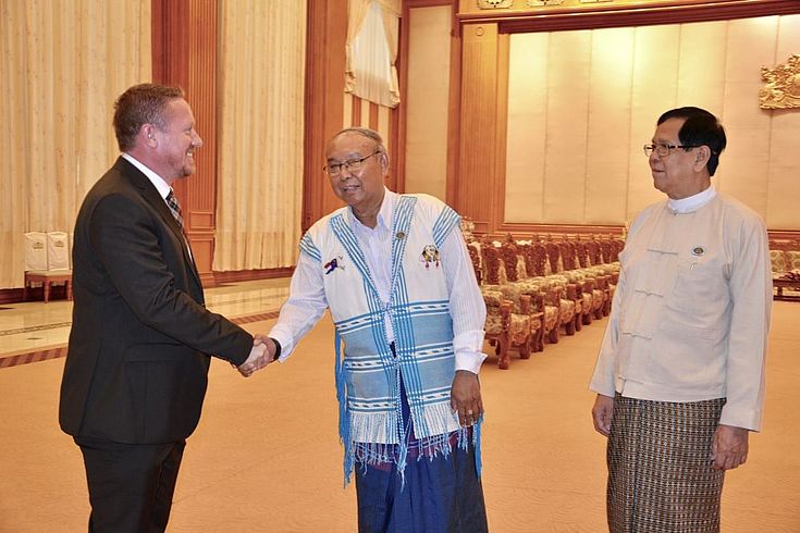 Achim Munz with Amyotha Hluttaw H.E. Mahn Win Khaing Than and Deputy Speaker H.E. U Aye Tha Aung.